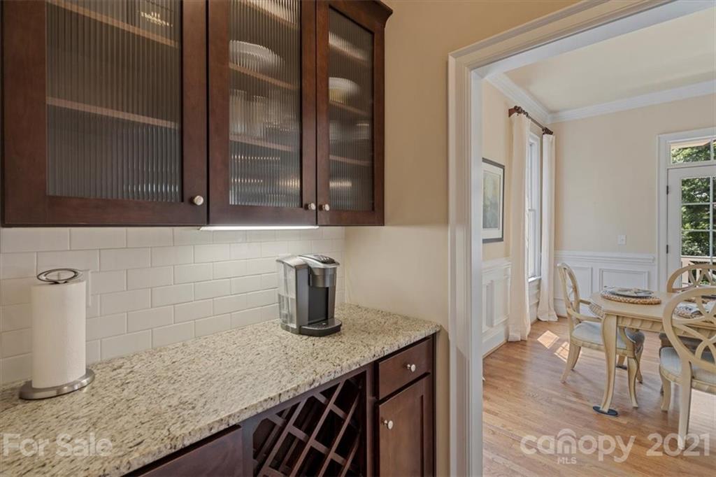 851 Stratford Run Drive Fort Mill, SC 29708 - Photo 18 of 48 a kitchen with a sink a stove and cabinets
