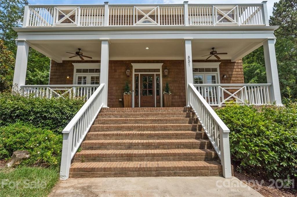 851 Stratford Run Drive Fort Mill, SC 29708 - Photo 3 of 48 a view of a building with stairs and a porch