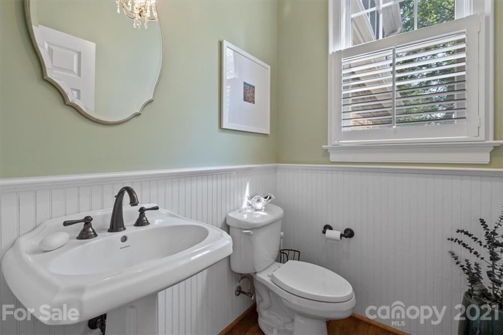 851 Stratford Run Drive Fort Mill, SC 29708 - Photo 22 of 48 a bathroom with a toilet a sink and a mirror