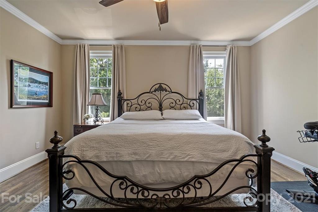 851 Stratford Run Drive Fort Mill, SC 29708 - Photo 30 of 48 a bedroom with a bed and a table