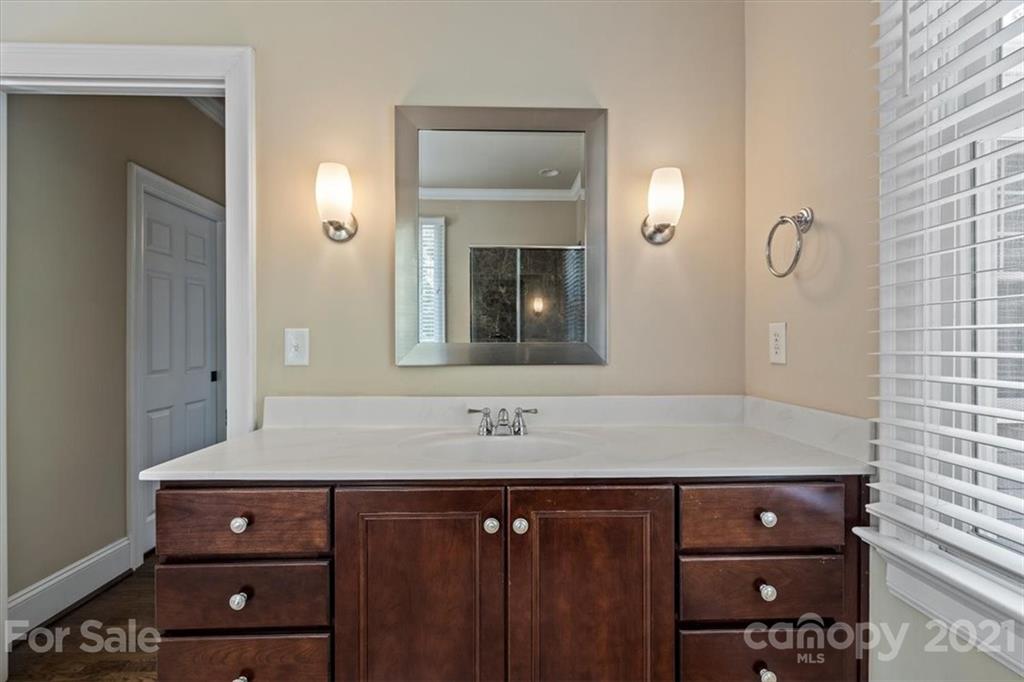 851 Stratford Run Drive Fort Mill, SC 29708 - Photo 33 of 48 a bathroom with a sink a vanity and a mirror