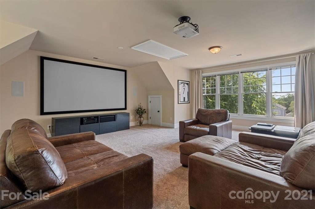 851 Stratford Run Drive Fort Mill, SC 29708 - Photo 36 of 48 a living room with furniture and a flat screen tv