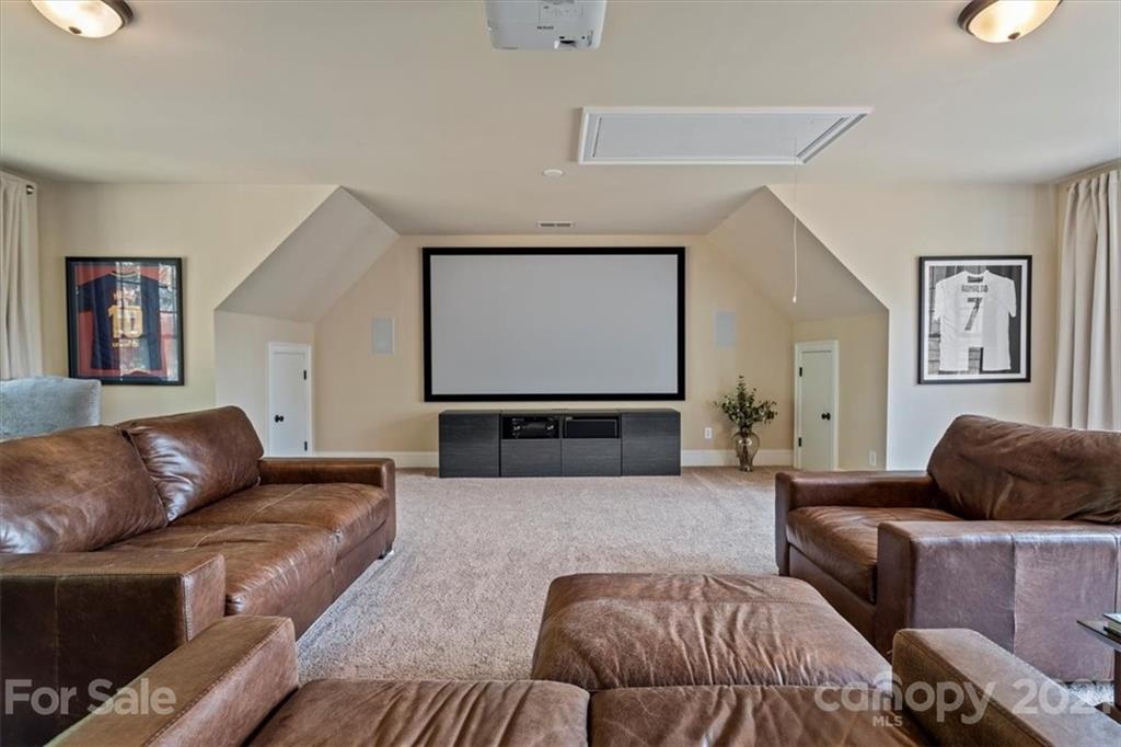 851 Stratford Run Drive Fort Mill, SC 29708 - Photo 37 of 48 a living room with furniture and a flat screen tv