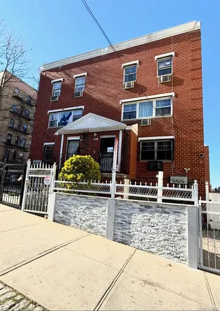 a front view of a building with street