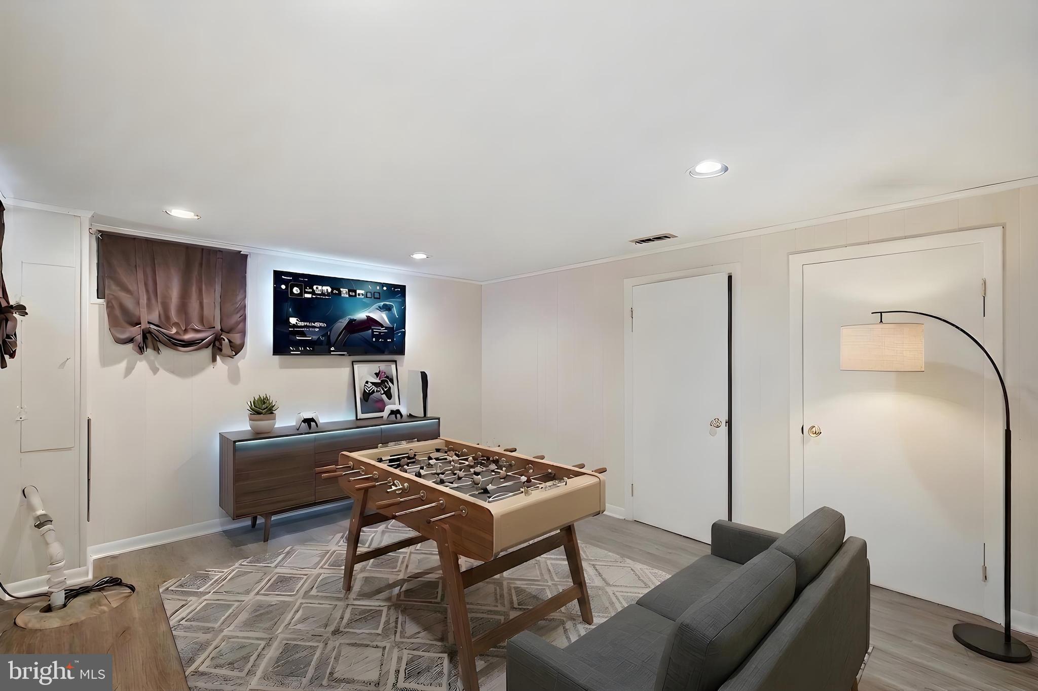 107 Oakway Road Lutherville-Timonium, MD 21093 - Photo 38 of 52 Virtually staged lower level - lots of space!