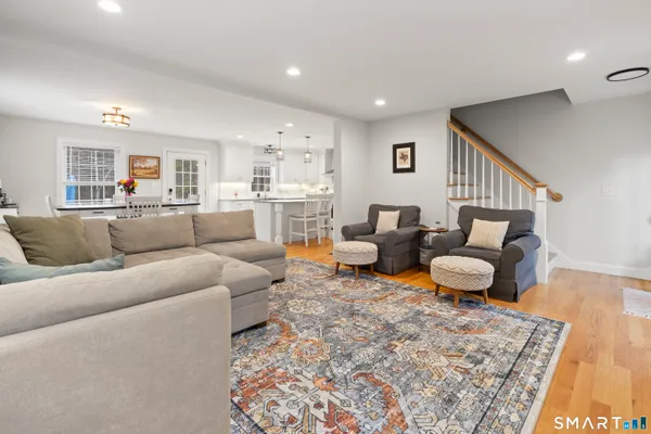 a living room with furniture and a couch