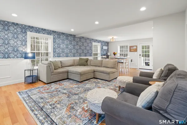a living room with furniture and a couch
