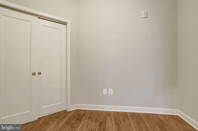 a view of small space with wooden floor