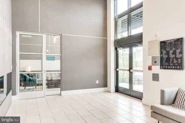a view of livingroom with furniture and windows