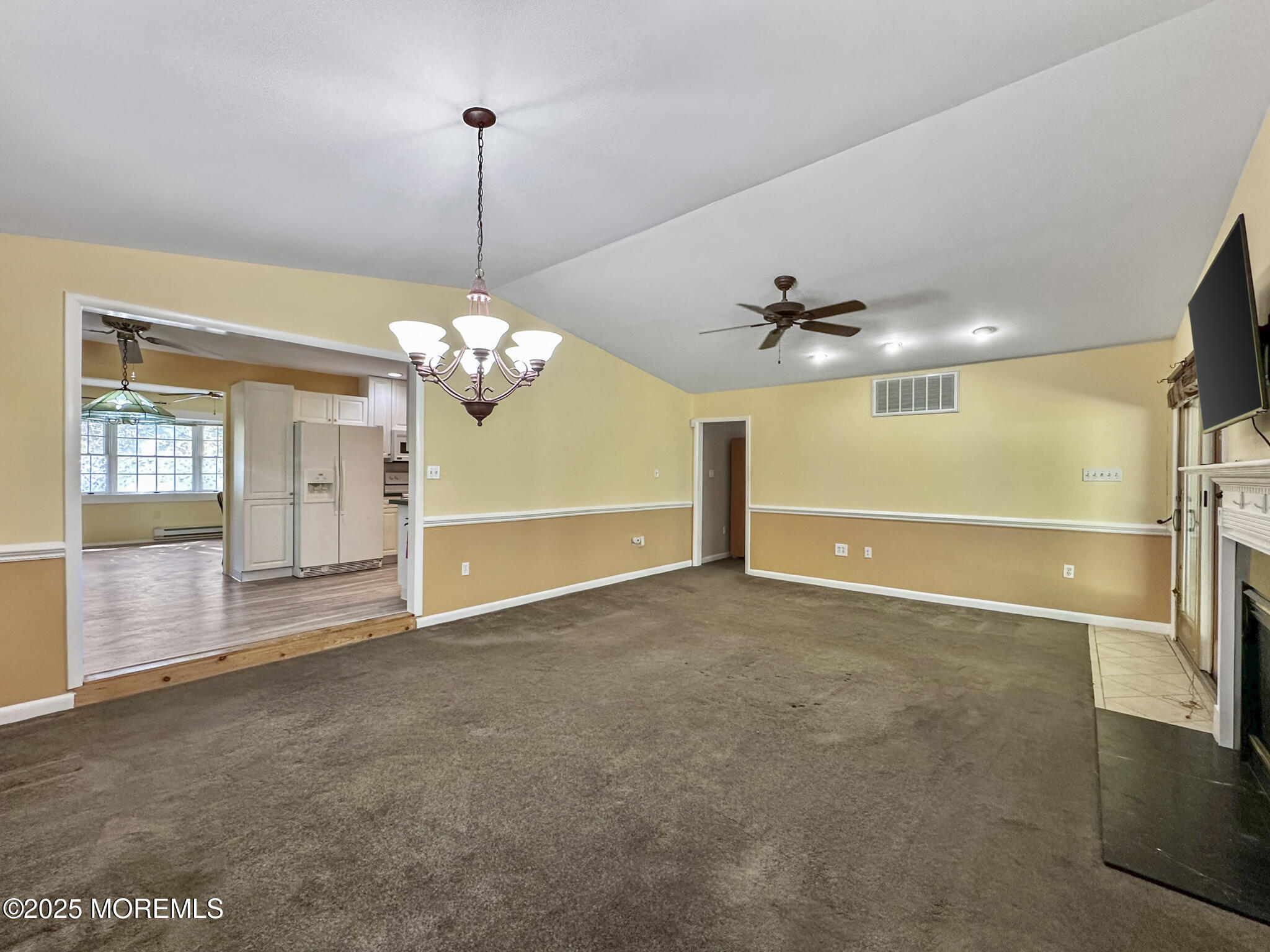192 Dolphin Road Manahawkin, NJ 08050 - Photo 16 of 25 a view of a livingroom with a ceiling fan