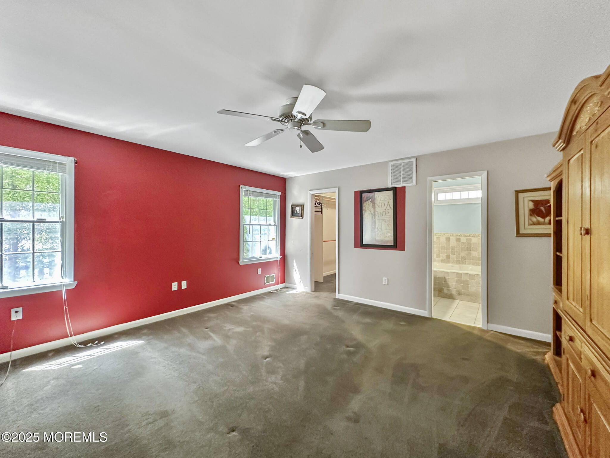 192 Dolphin Road Manahawkin, NJ 08050 - Photo 20 of 25 a view of an empty room with a window