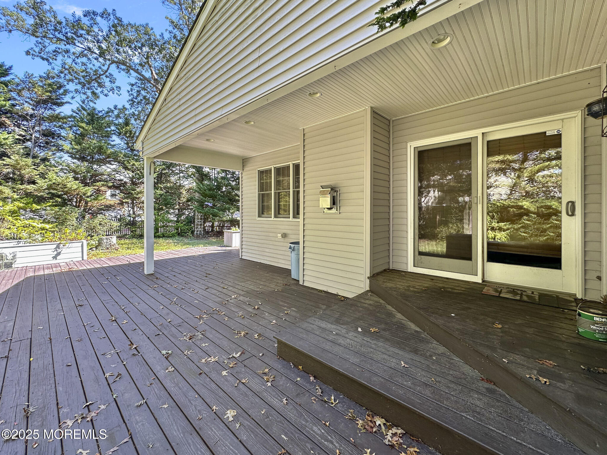 192 Dolphin Road Manahawkin, NJ 08050 - Photo 23 of 25 a view of a house with a wooden deck