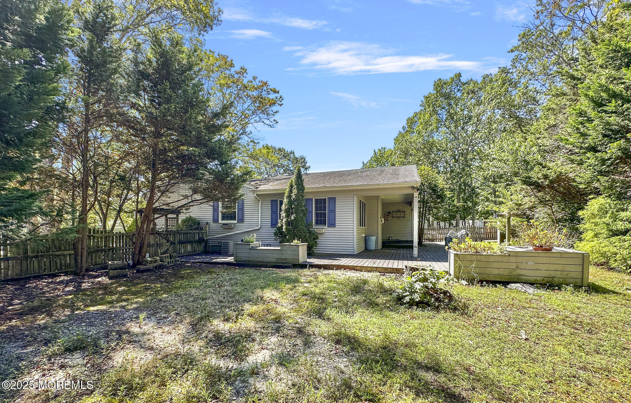 192 Dolphin Road Manahawkin, NJ 08050 - Photo 25 of 25 a front view of a house with a garden