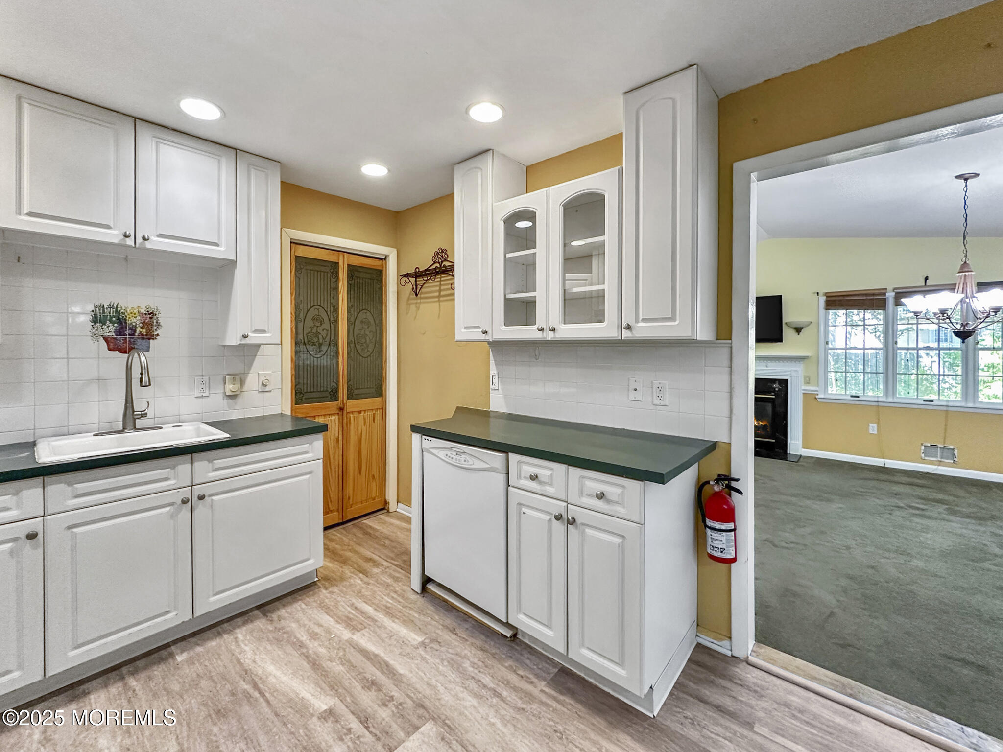 192 Dolphin Road Manahawkin, NJ 08050 - Photo 4 of 25 a kitchen with granite countertop a sink and cabinets