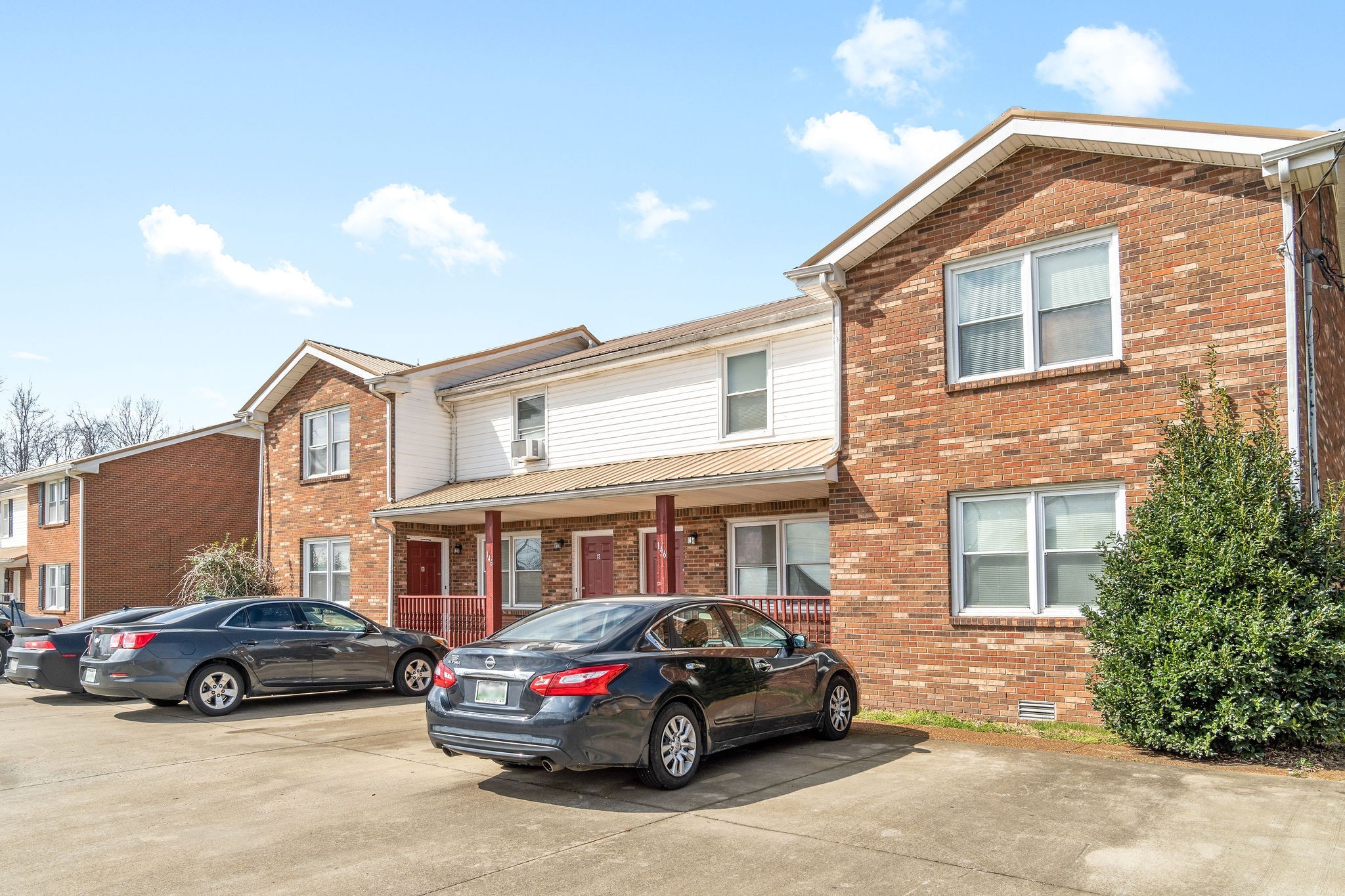 a car parked in front of a house