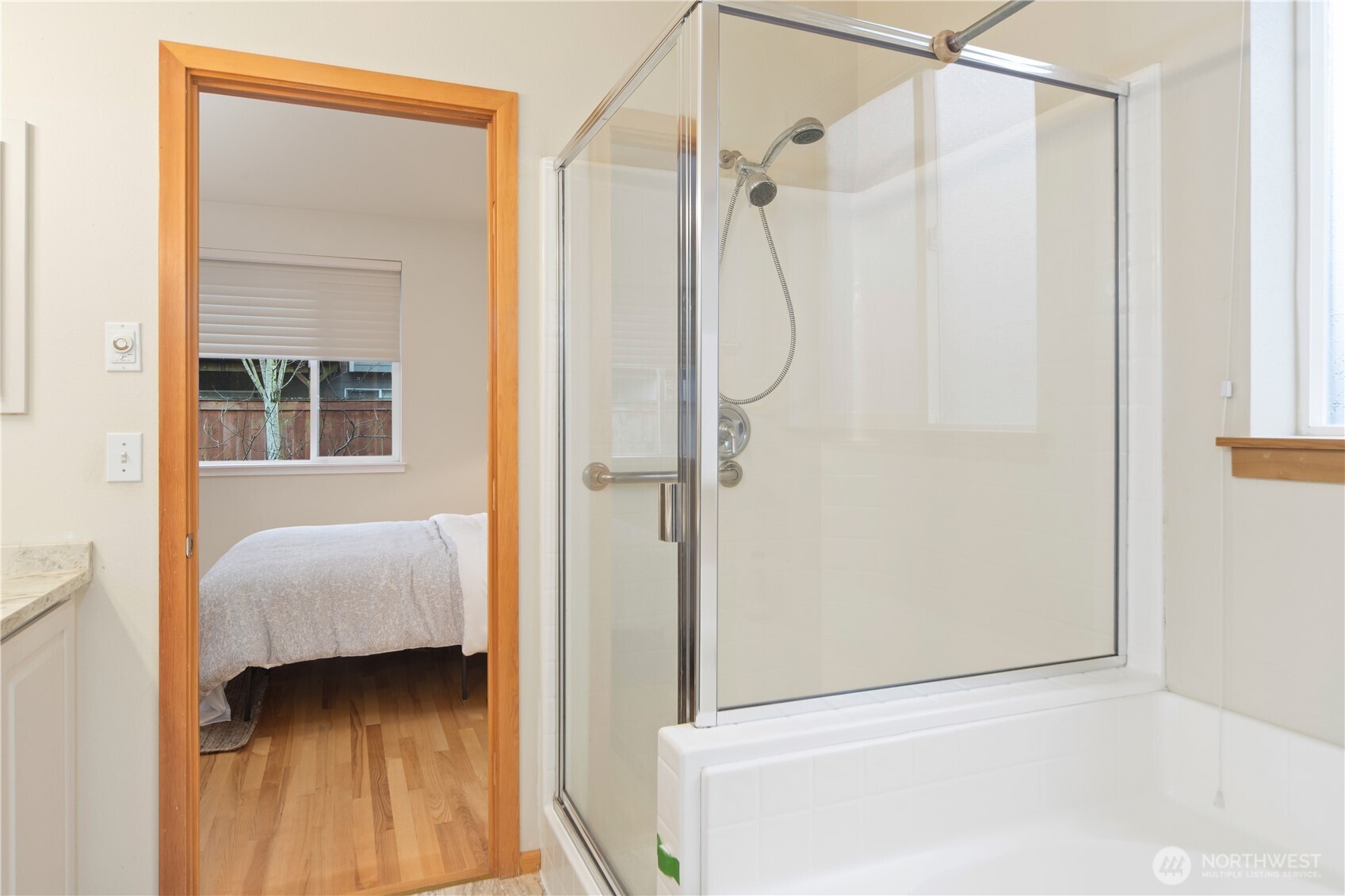 18130 Sunrise Ridge Avenue Northeast Poulsbo, WA 98370 - Photo 20 of 30 a view of a bedroom from a hallway