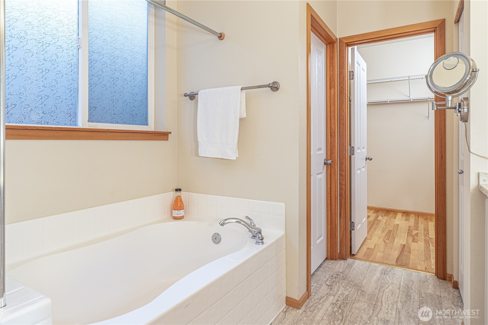 18130 Sunrise Ridge Avenue Northeast Poulsbo, WA 98370 - Photo 21 of 30 a bathroom with a tub and a shower