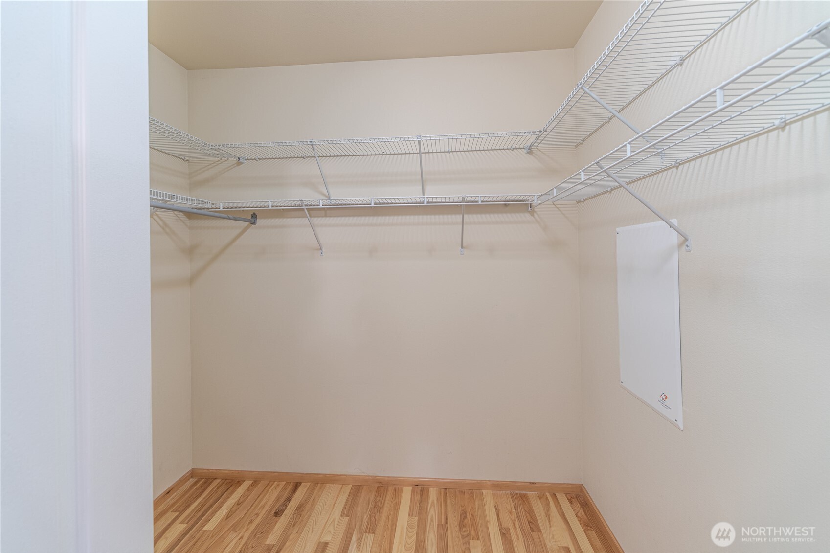 18130 Sunrise Ridge Avenue Northeast Poulsbo, WA 98370 - Photo 22 of 30 a view of a room with racks on the wall