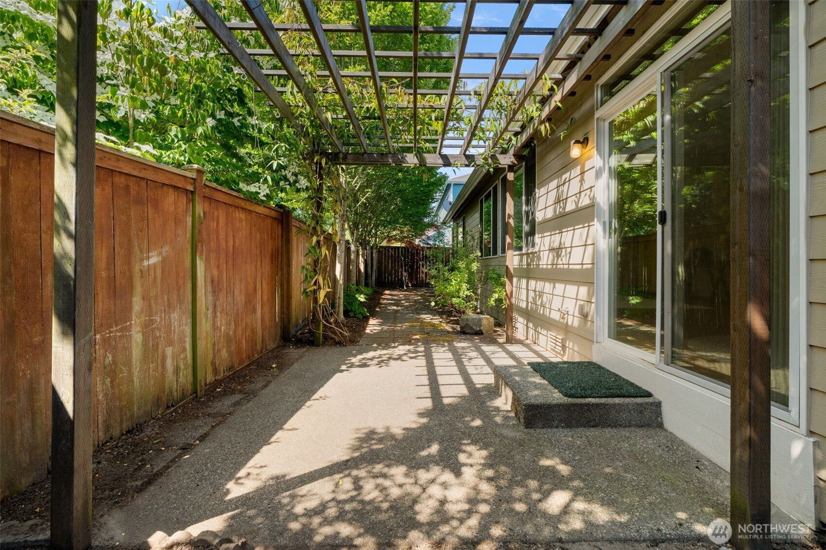 18130 Sunrise Ridge Avenue Northeast Poulsbo, WA 98370 - Photo 29 of 30 a house view with a outdoor space