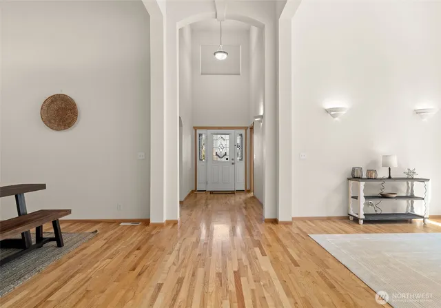 a workspace with furniture hardwood and a window