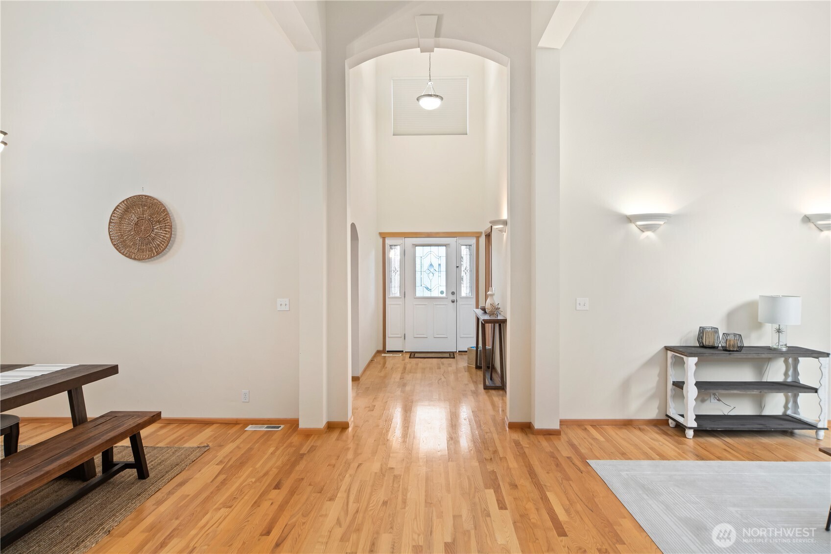 18130 Sunrise Ridge Avenue Northeast Poulsbo, WA 98370 - Photo 6 of 30 wooden floor in a hall with a workspace