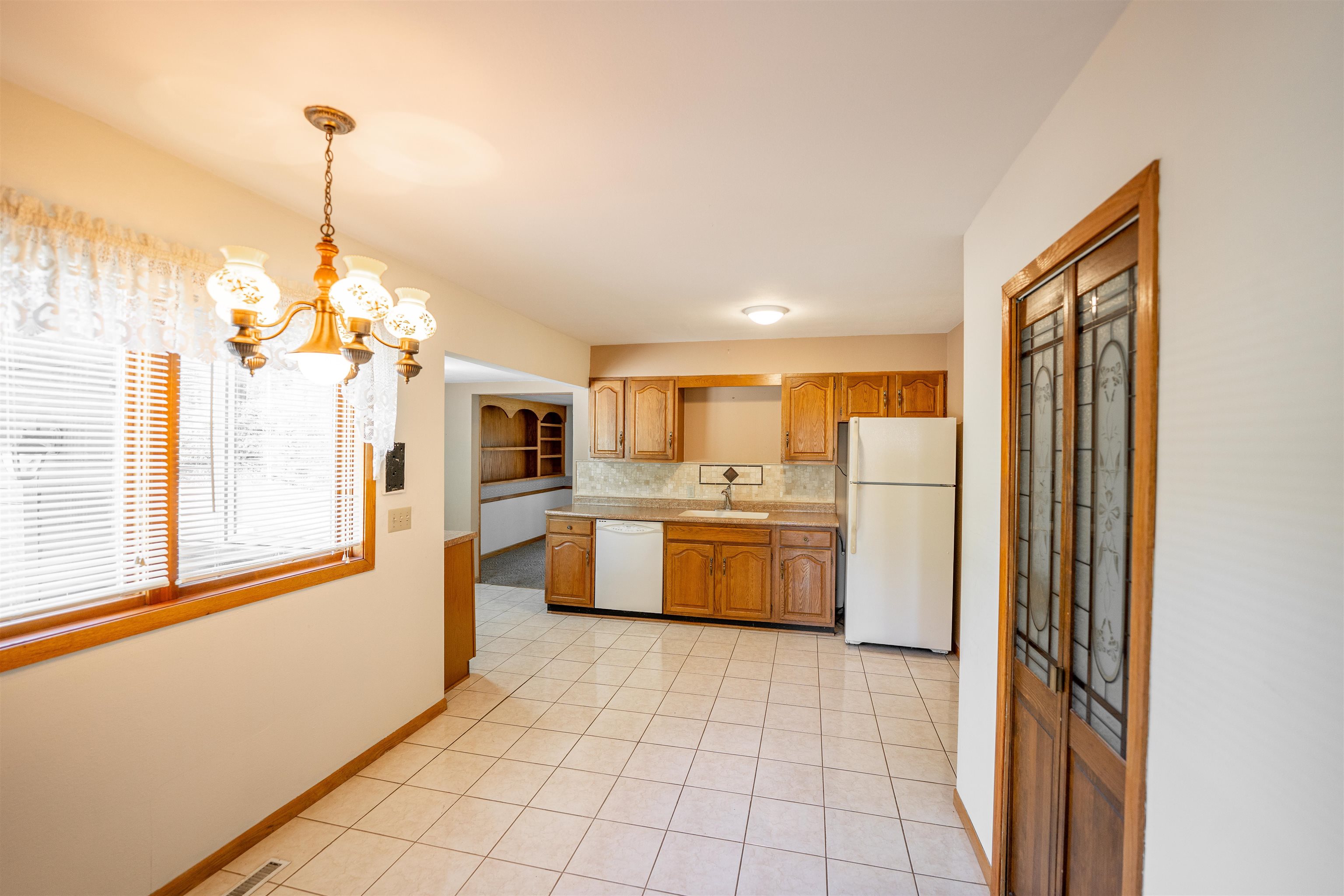 15361 South Bluff Road South Beloit, IL 61080 - Photo 13 of 64 a kitchen that has a lot of cabinets and refrigerator