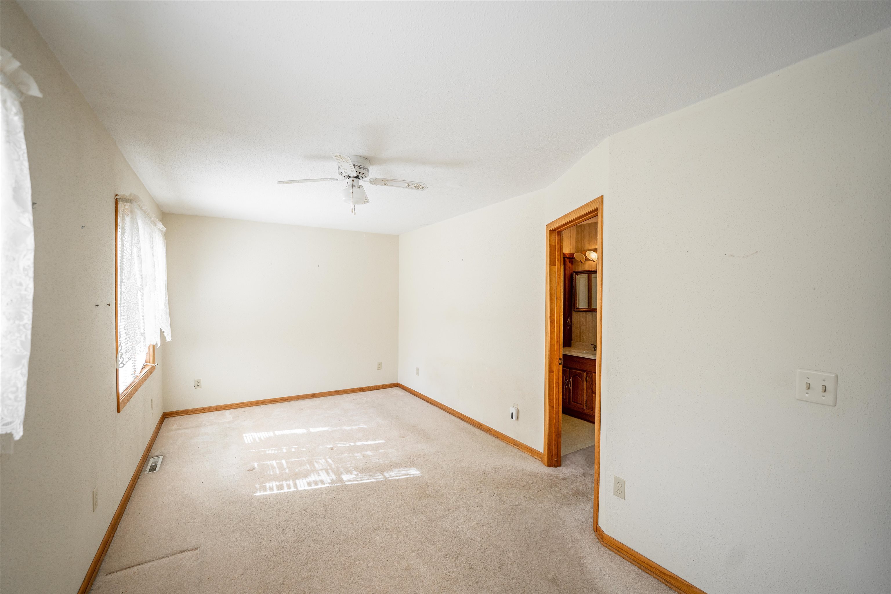 15361 South Bluff Road South Beloit, IL 61080 - Photo 22 of 64 an empty room with windows and closet