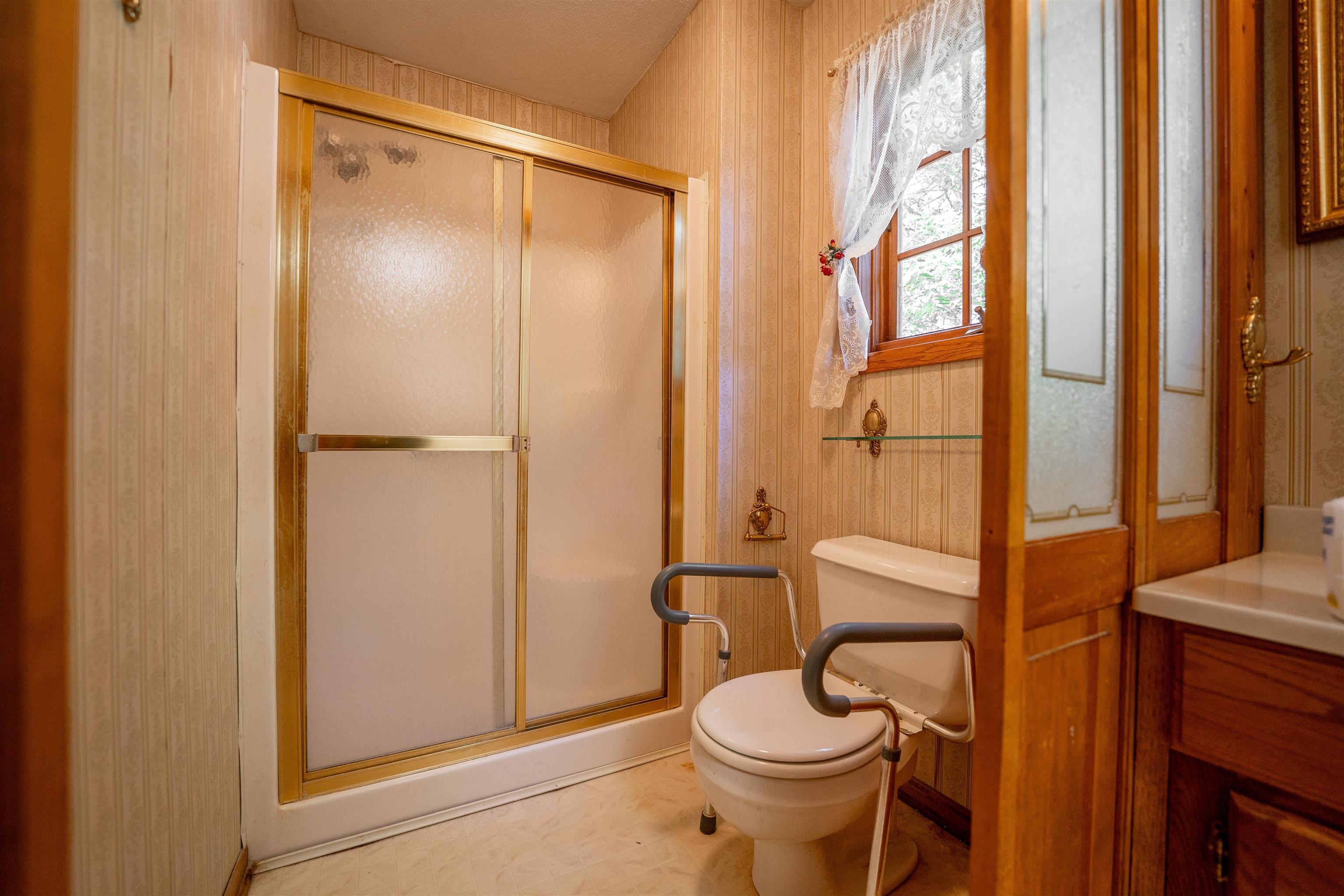 15361 South Bluff Road South Beloit, IL 61080 - Photo 25 of 64 a bathroom with a toilet and shower
