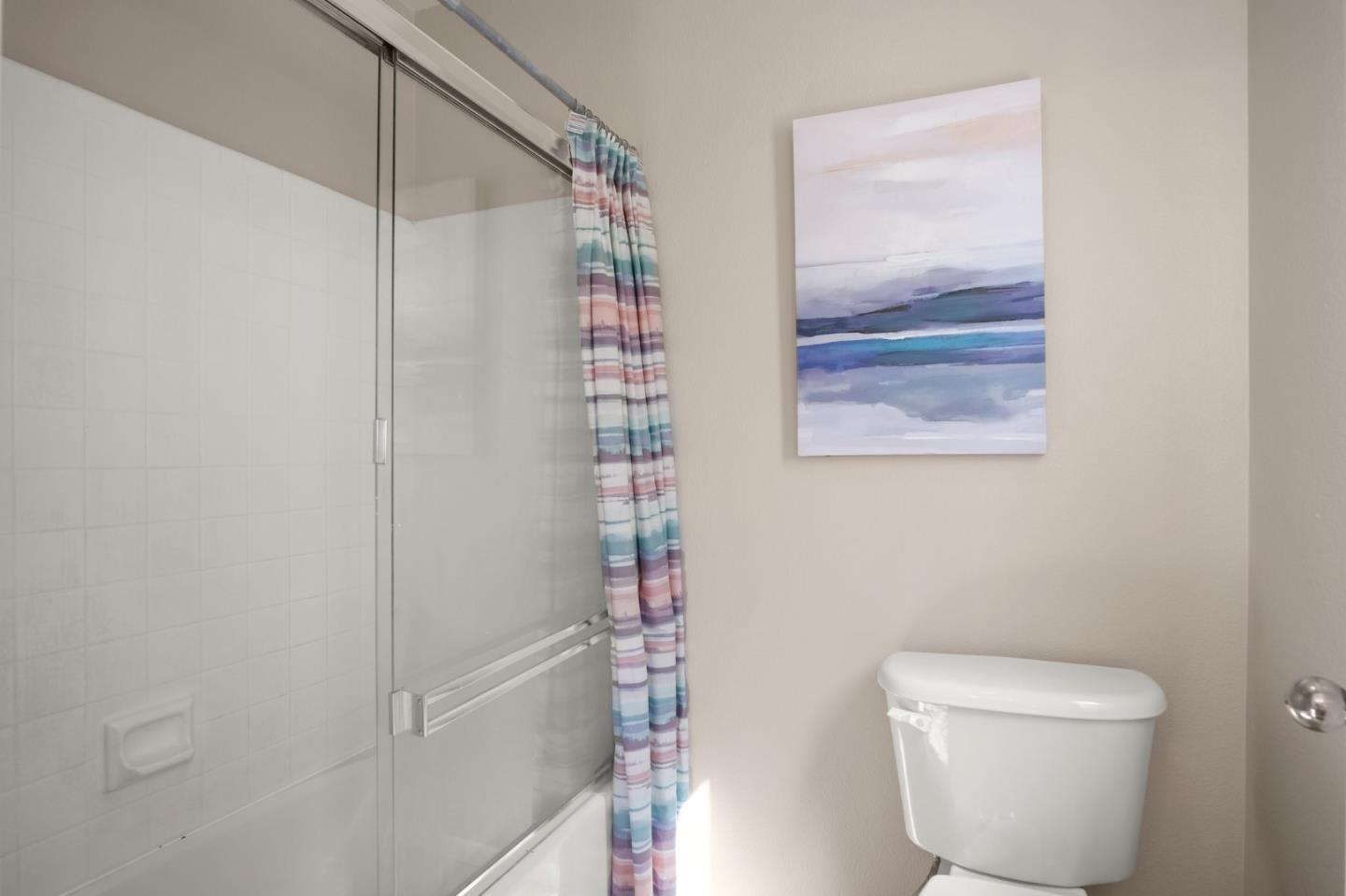 3021 Simms Lane Tracy, CA 95377 - Photo 13 of 33 a bathroom with a toilet and shower