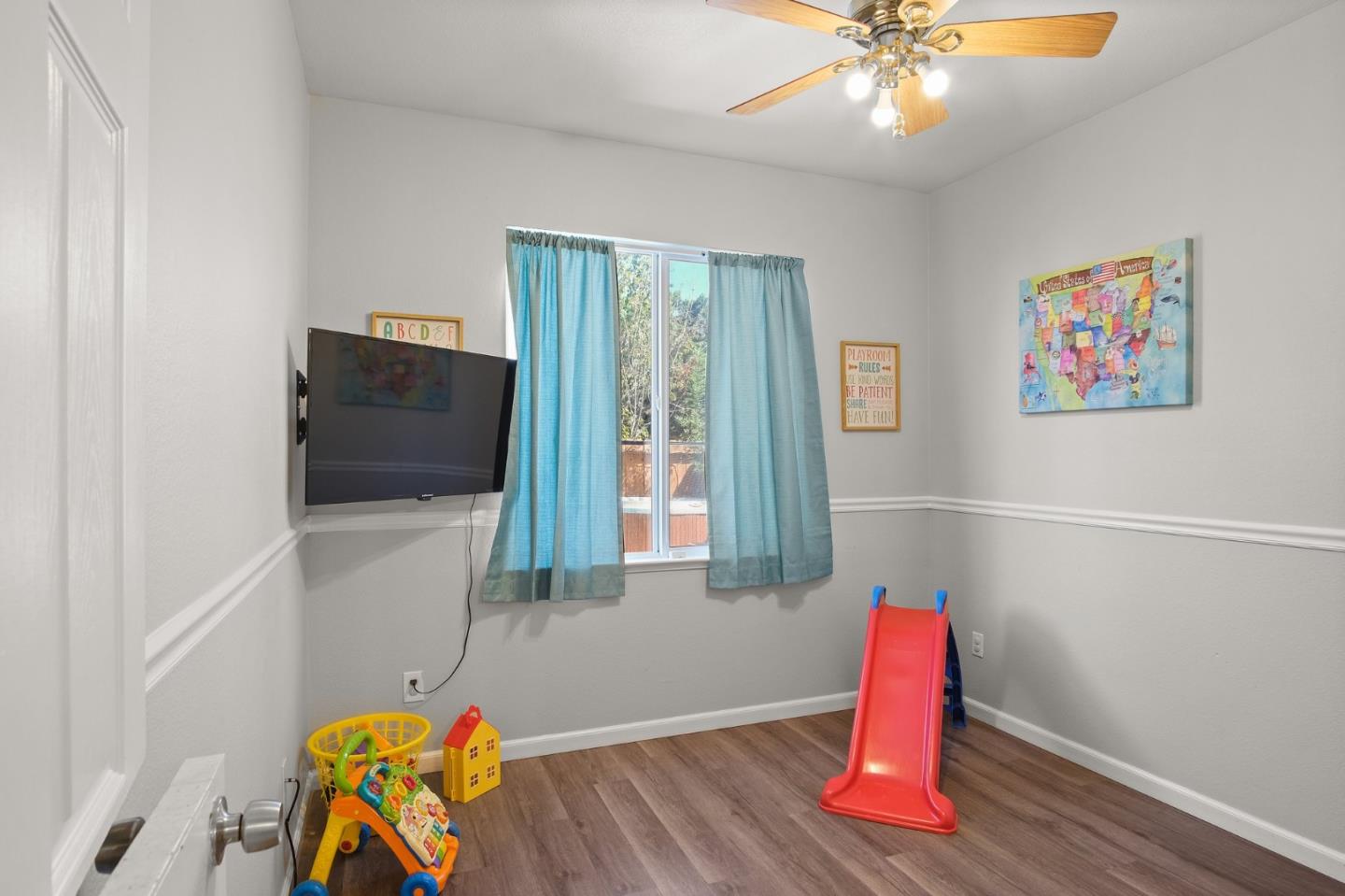 3021 Simms Lane Tracy, CA 95377 - Photo 16 of 33 a room with furniture and wooden floor