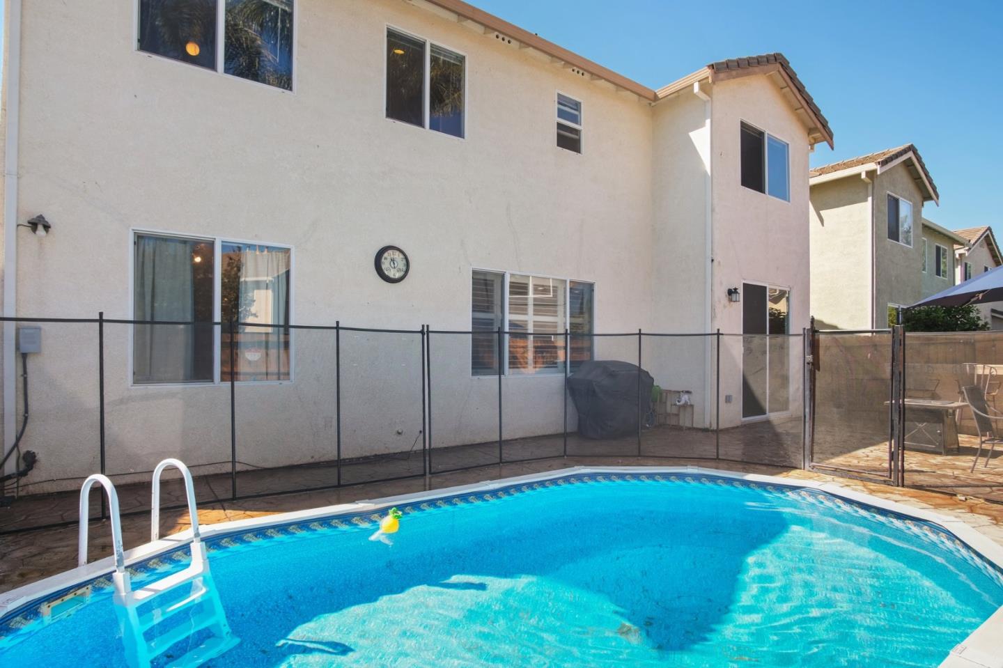 3021 Simms Lane Tracy, CA 95377 - Photo 24 of 33 a bathroom with a sink and mirror