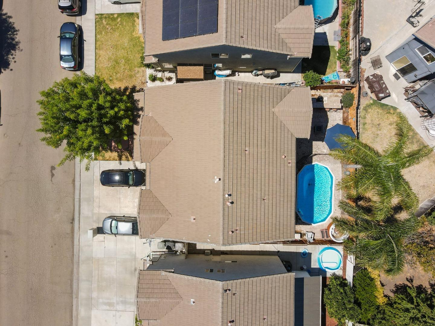 3021 Simms Lane Tracy, CA 95377 - Photo 28 of 33 an aerial view of residential houses with outdoor space