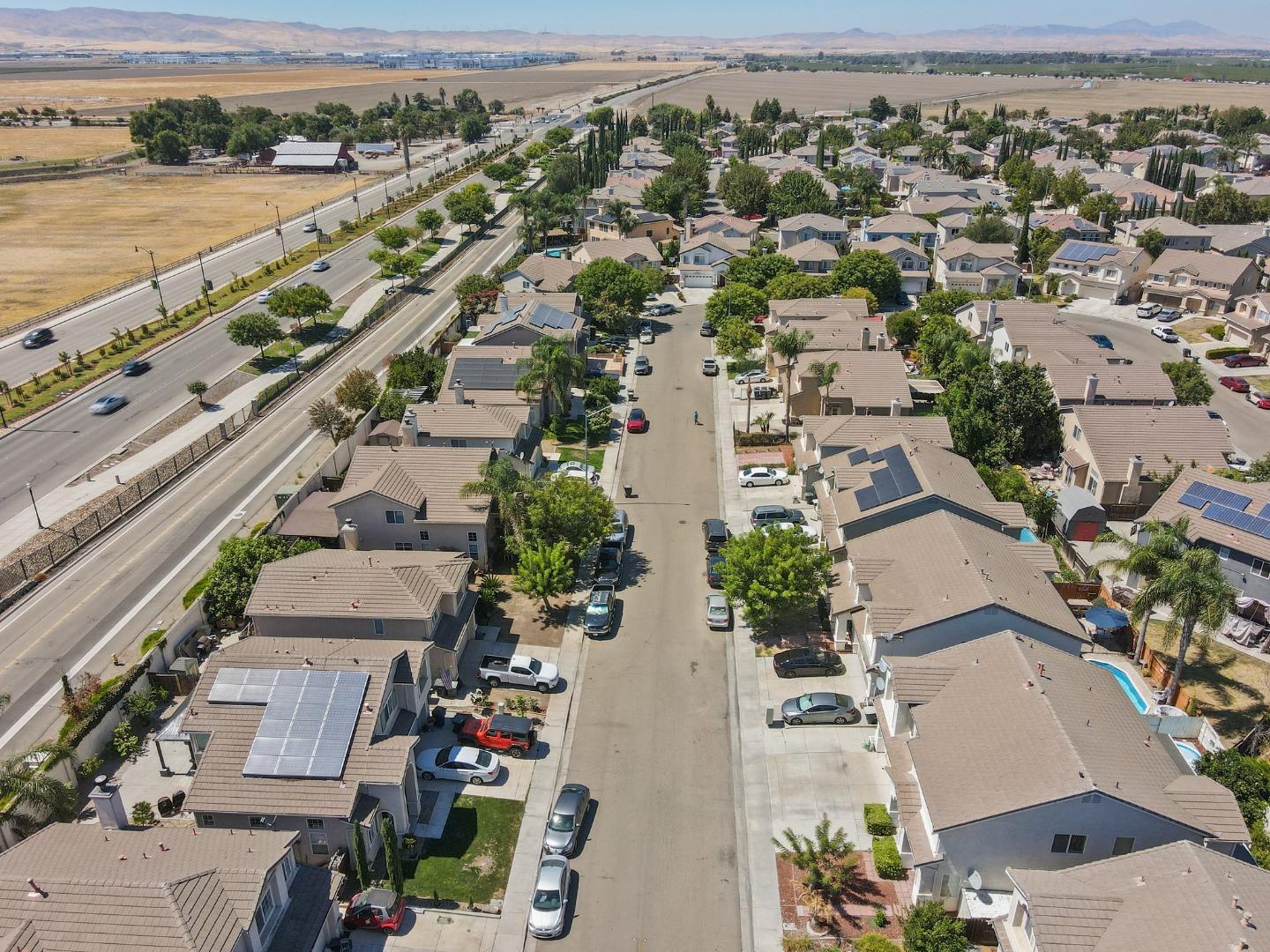 3021 Simms Lane Tracy, CA 95377 - Photo 31 of 33 an aerial view of residential houses with outdoor space