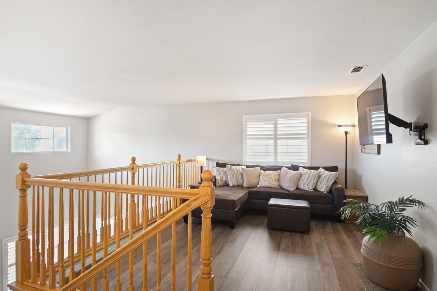3021 Simms Lane Tracy, CA 95377 - Photo 8 of 33 a living room with furniture and a wooden floor