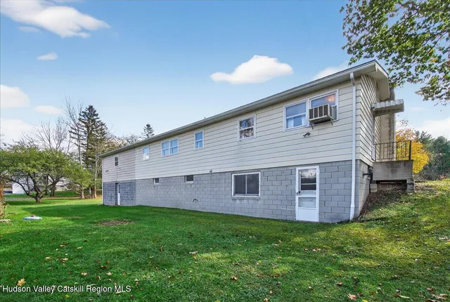 a backyard of a house with lots of green space