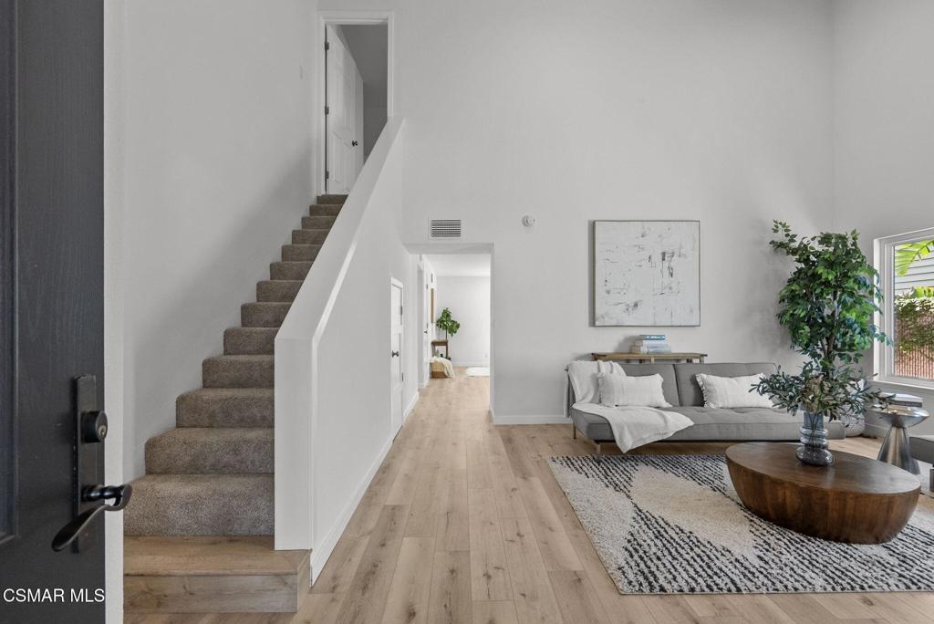 1882 Larch Street Simi Valley, CA 93065 - Photo 2 of 34 a living room with furniture and a potted plant