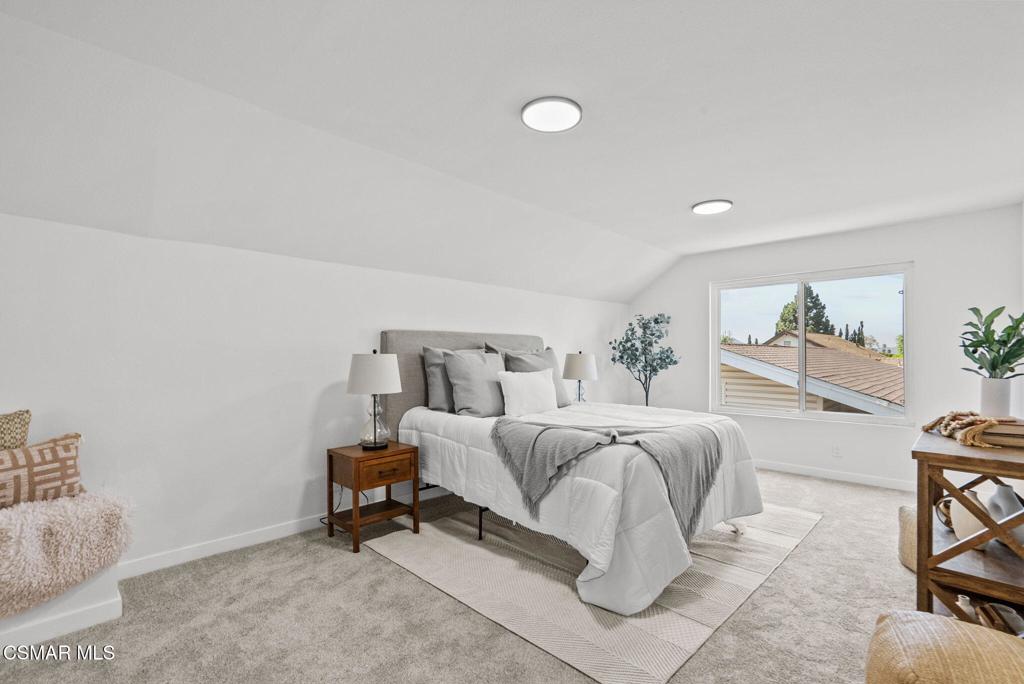 1882 Larch Street Simi Valley, CA 93065 - Photo 21 of 34 a bed room with furniture and a lamp