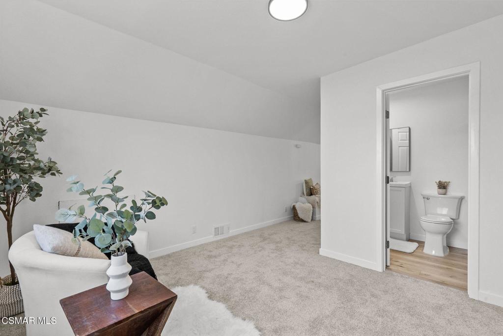 1882 Larch Street Simi Valley, CA 93065 - Photo 25 of 34 a living room with furniture and a potted plant