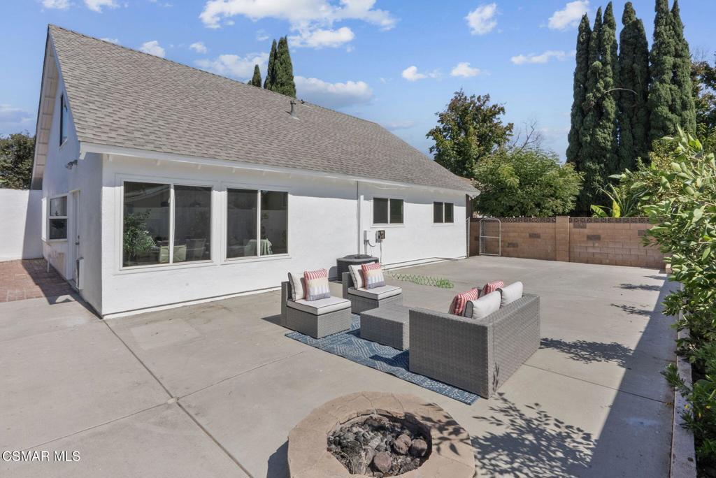 1882 Larch Street Simi Valley, CA 93065 - Photo 28 of 34 a front view of a house with a garden