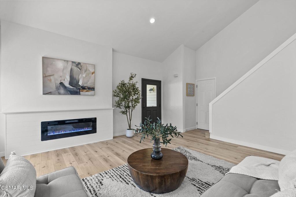 1882 Larch Street Simi Valley, CA 93065 - Photo 4 of 34 a living room with furniture and a fireplace