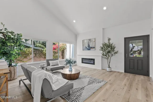 a kitchen with a sink stove and refrigerator