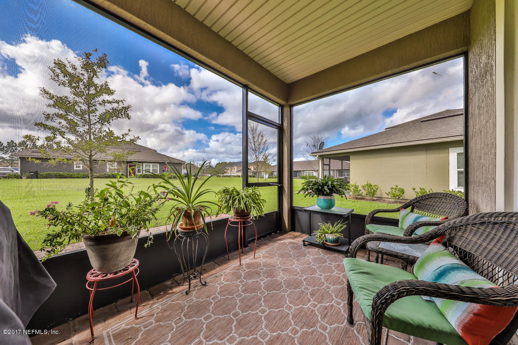 3207 Chestnut Ridge Way Orange Park, FL 32065 - Photo 24 of 26 Screened Lanai
