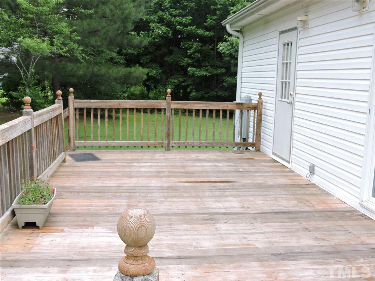 320 Moriah Road Rougemont, NC 27572 - Photo 14 of 16 a view of a chair and table in the balcony