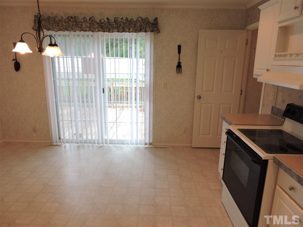 320 Moriah Road Rougemont, NC 27572 - Photo 6 of 16 a kitchen with windows and a sink