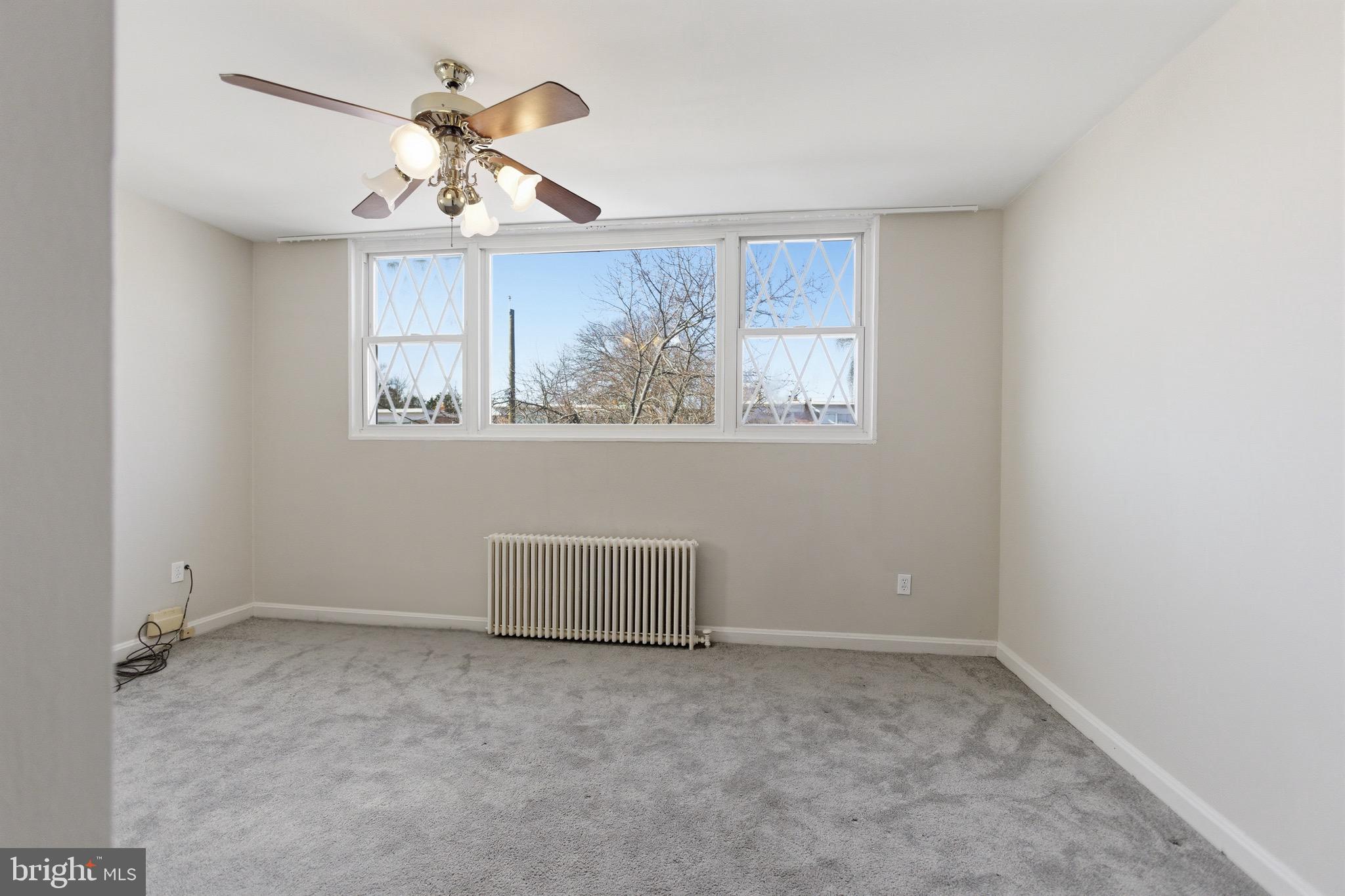 7519 8th Street Northwest Washington, DC 20012 - Photo 12 of 19 an empty room with a window