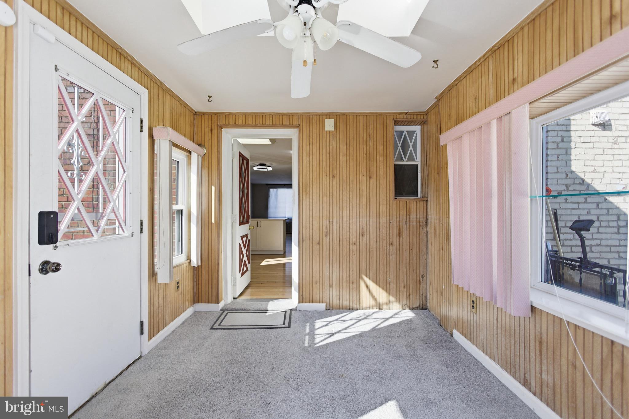 7519 8th Street Northwest Washington, DC 20012 - Photo 8 of 19 a view of a hallway with wooden floor and windows