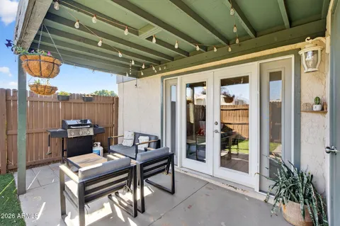 a balcony with furniture