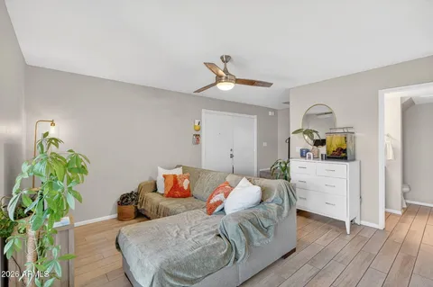 a living room with a couch and a flat screen tv