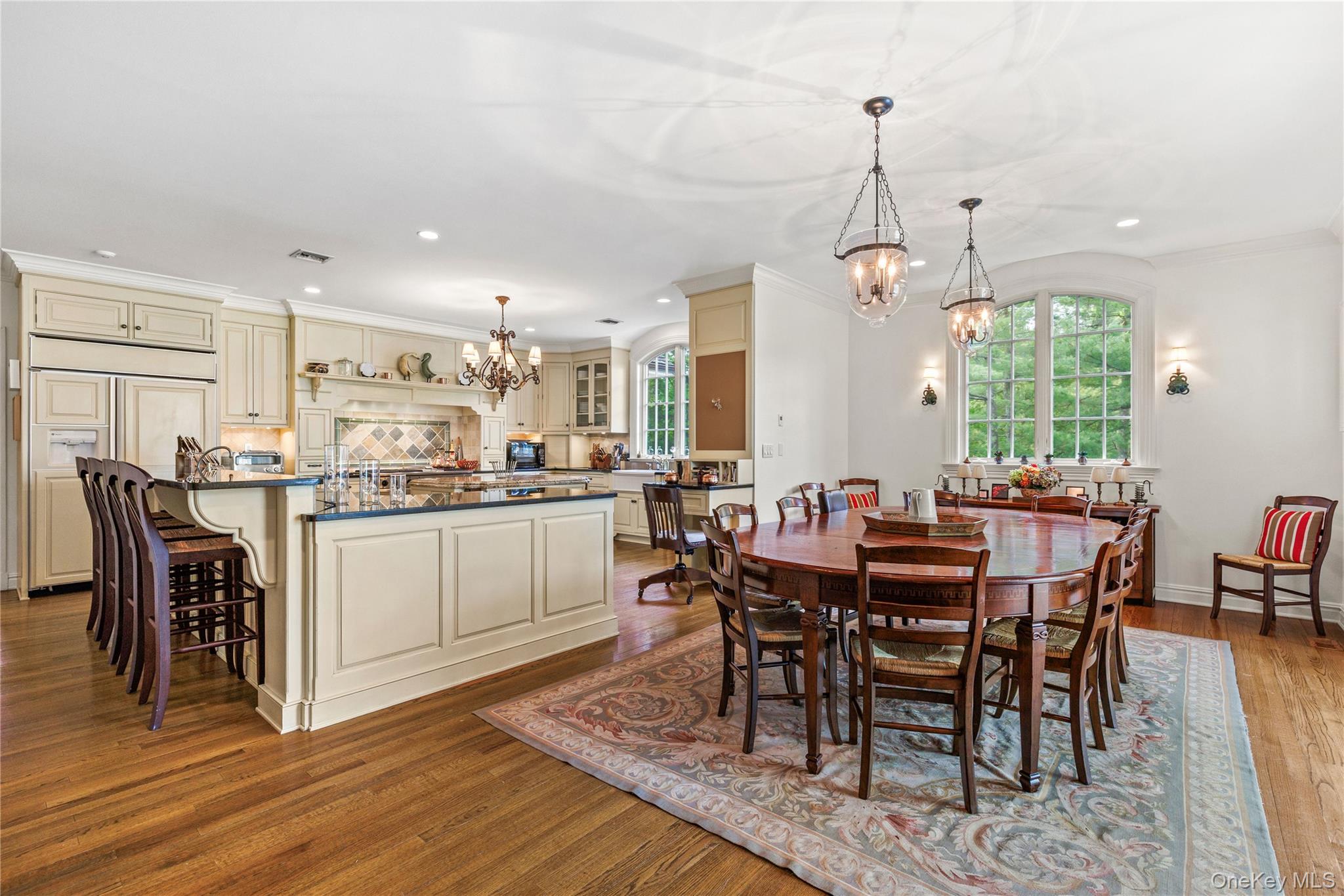 63 Old Mill River Road Pound Ridge, NY 10576 - Photo 9 of 47 a view of a dining room with furniture window and wooden floor