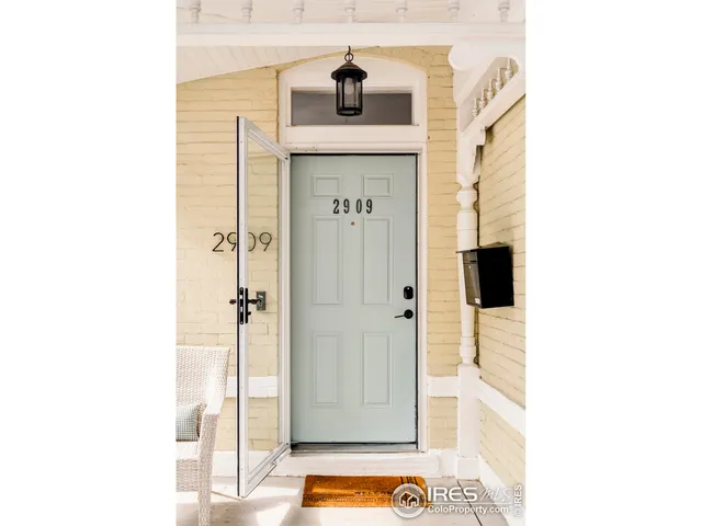 a view of hallway with mirror